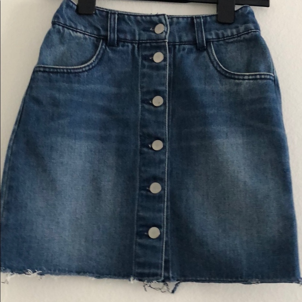 H&M mini blue denim skirt in size 2 button down